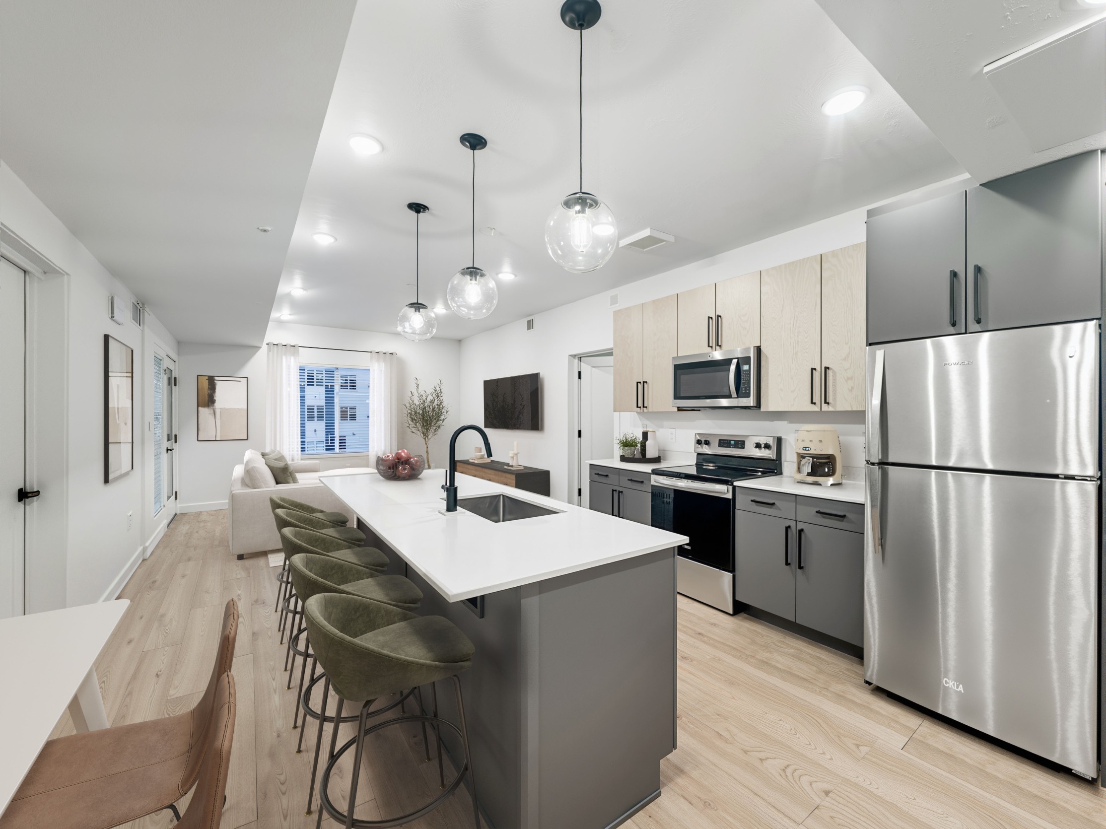 Kitchen and living room of a 3 bedroom apartment at Promontory Place
