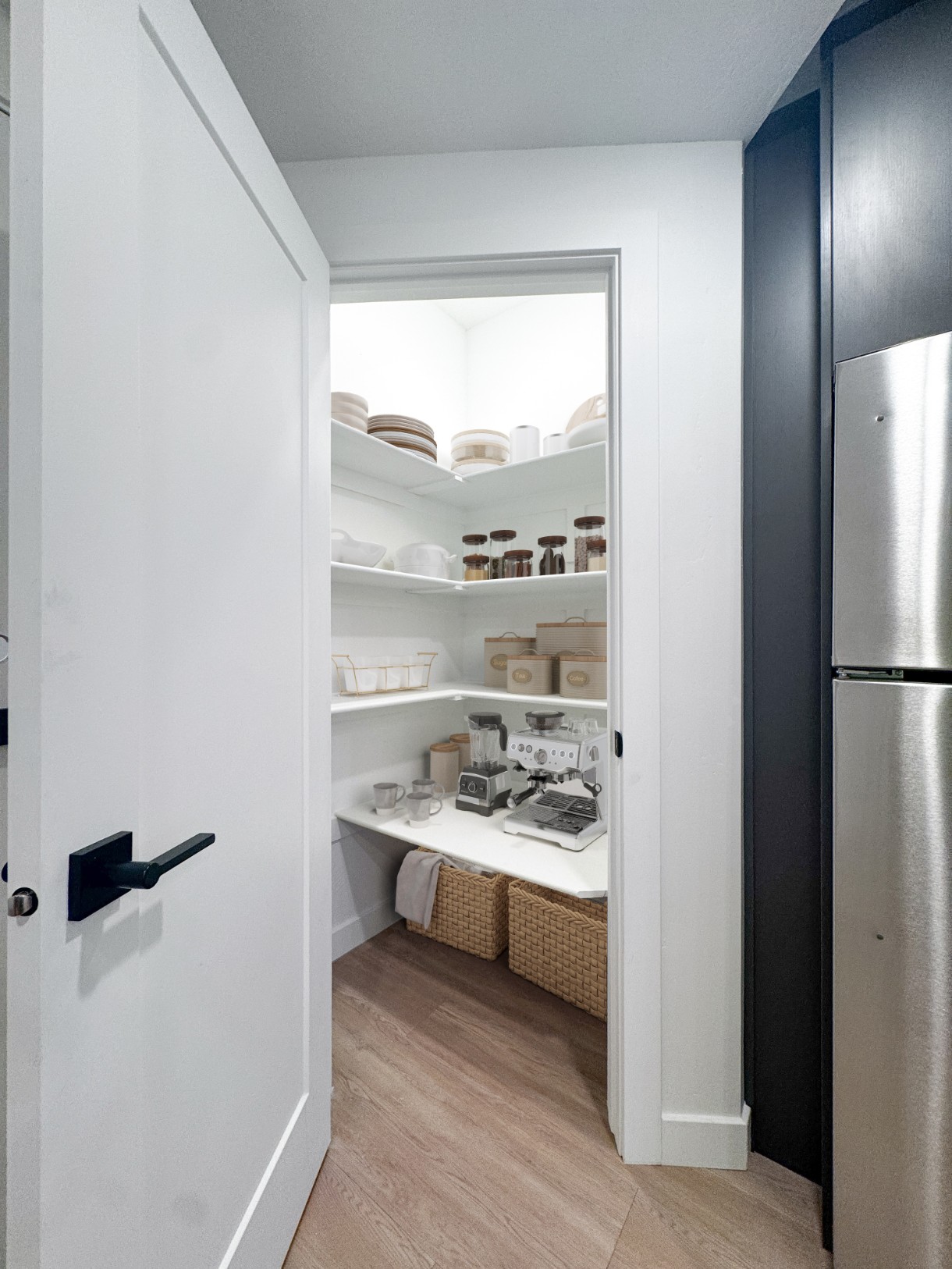 Kitchen pantry in a model apartment at Promontory Place
