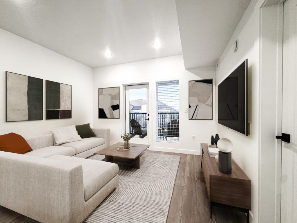 Living room opening onto a private balcony at Promontory Place