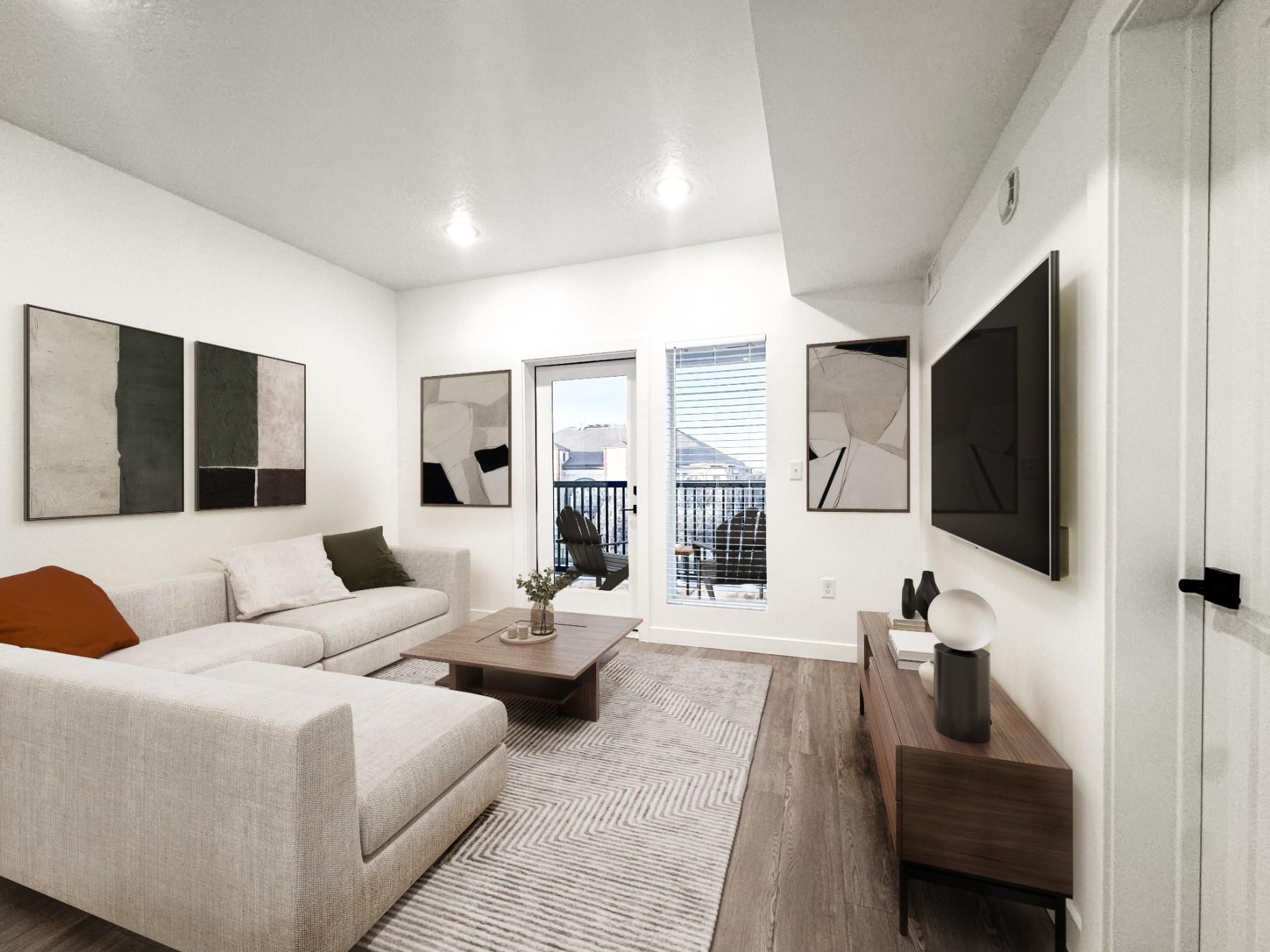 Living room opening onto a private balcony at Promontory Place