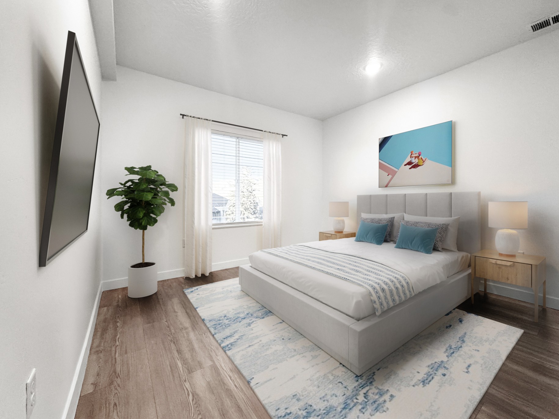 Primary bedroom with 9-foot ceilings and lots of natural light