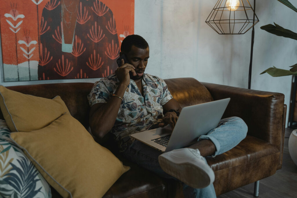 Man working on his laptop in his living room